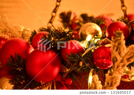 Close-up of the Christmas floral wreaths. Festive and home decoration. Winter season, winter festive. Christmas celebration, Xmas celebration. For background use. 131685017