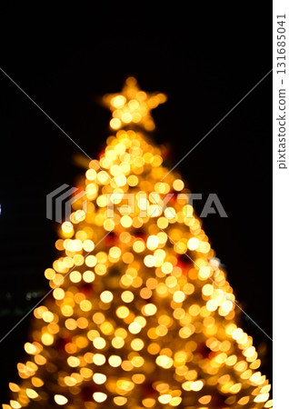 Bokeh effect of the Christmas tree. Festive decoration. Full of ornaments. Winter season, winter festive. Christmas celebration, Xmas celebration. For background use. Bokeh effect of the Christmas tree. Festive decoration. Full of ornaments. Winter season, winter festive. Christmas celebration, Xmas celebration. For background use. 131685041