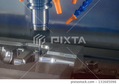 The CNC milling machine finish cut the mold parts by solid ball nose end mill tool. The CNC milling machine finish cut the mold parts by solid ball nose end mill tool. 131685098