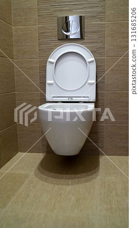 White ceramic toilet bowl in modern bathroom interior 131685206