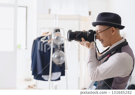 Cameraman taking pictures in the studio 131685282