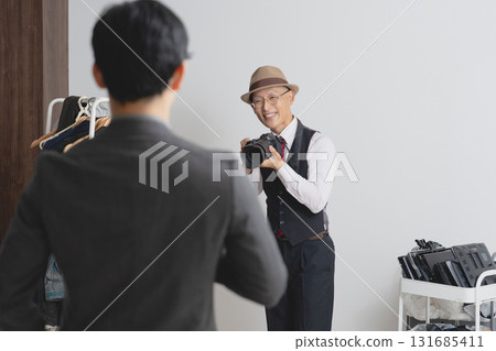 Cameraman taking pictures in the studio 131685411