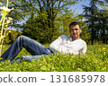 lying in the grass 131685978