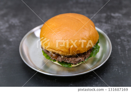beef patty hamburger on a plate 131687169