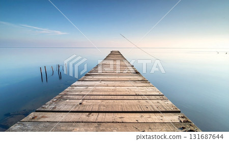 An old wooden pier An old wooden pier 131687644