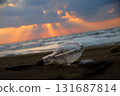 A fishing light washed up on the beach 131687814