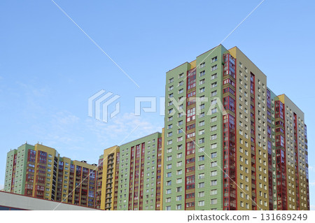 A residential building in a new area of the city. 131689249