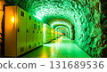 Illuminated tunnel with electrical panels and stone walls showing industrial interior design style 131689536