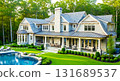 Aerial view of large house with pool and patio surrounded by lush greenery on a sunny day outside home 131689537