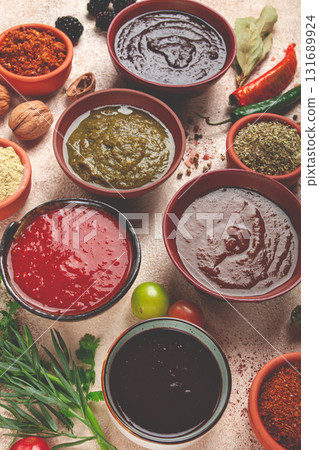 assortment of Georgian sauces and spices, top view, set of spices and tkemali, Georgian, food background, assortment of Georgian sauces and spices, top view, set of spices and tkemali, Georgian, food background, 131689924