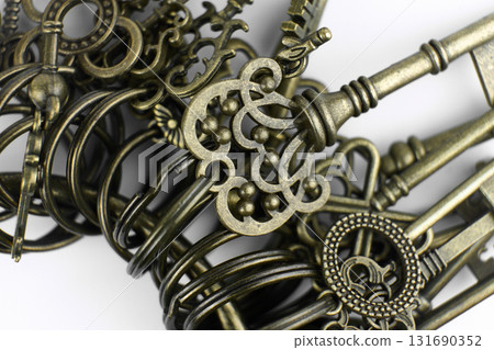 Detailed old keys showcase unique shapes and styles Detailed old keys showcase unique shapes and styles 131690352