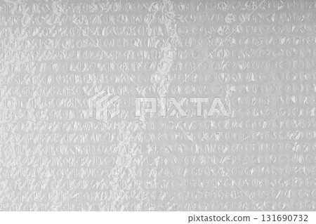 Close up of a sheet of plastic bubble wrap texture for background. Close up of a sheet of plastic bubble wrap texture for background. 131690732