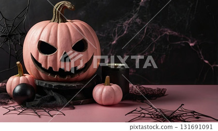 A stylish Halloween composition featuring black pumpkins, bats, and cobwebs on a soft pink background. A modern, spooky holiday backdrop with room for text. 131691091
