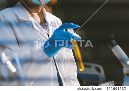 Researchers working in the clinical laboratory 131691385