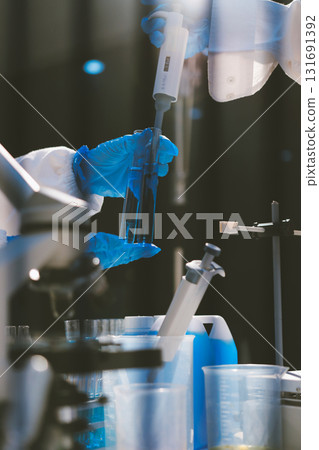 Researchers working in the clinical laboratory 131691392