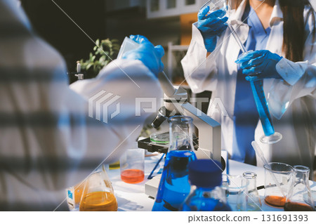Researchers working in the clinical laboratory 131691393