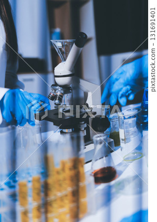 Researchers working in the clinical laboratory Researchers working in the clinical laboratory 131691401