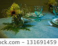 The festive table setting includes a stylish napkin on the plate, enhancing the overall look and making the meal feel extra special. 131691459