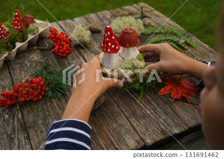 Fall-themed project made from natural and repurposed materials, featuring a mushroom design. Fall-themed project made from natural and repurposed materials, featuring a mushroom design. 131691462
