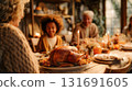 Thanksgiving dinner with family. Thanksgiving scene features a roasted turkey on a table, a family gathering around a wooden table This is AI-generated item 131691605