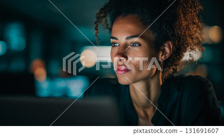 Thoughtful woman gazing with a focused expression. A professional office worker lit by soft light, looking off-camera with a contemplative expression. This is AI-generated item 131691607