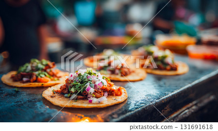 Delicious tacos with fresh toppings on a metal surface. Close-up shot of several tacos, each filled with meat and topped with fresh cilantro, onions, and other ingredients This is AI-generated item 131691618