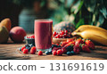 Delicious strawberry smoothie drink with fresh fruits on a rustic wooden kitchen table. A vibrant berry drink is surrounded by an assortment of fresh fruits This is AI-generated item 131691619