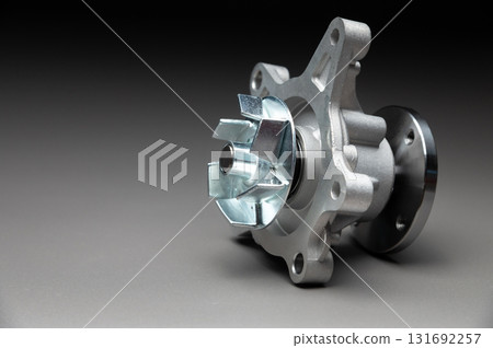 New parts for engine cooling system repair. Water pump for pumping coolant within the engine. 131692257