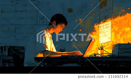 Focused student illuminated by laptop glow, working late at nigh Focused student illuminated by laptop glow, working late at nigh 131692314