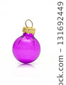 Purple glass Christmas ornament ball with golden cap isolated on white background. 131692449