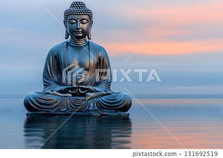 Serene Buddha Statue Meditating on Water at Dusk with Reflective 131692519