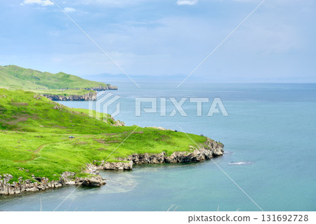 The nature of the Khasansky district of Primorsky Krai, Russia. The lip of the Teal of the Slavic Bay, the inner bay of Peter the Great in the summer. The nature of the Khasansky district of Primorsky Krai, Russia. The lip of the Teal of the Slavic Bay, the inner bay of Peter the Great in the summer. 131692728
