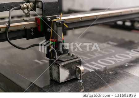 Stone engraving machine, perfect for creating intricate designs and personalized stonework 131692959