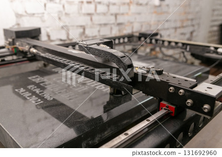 Stone engraving machine, perfect for creating intricate designs and personalized stonework 131692960
