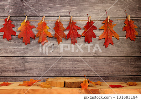 Empty wooden product display table with maple leaves on kitchen background, minimalist autumn concept, creative autumn composition and banner for display. Happy Thanksgiving greeting card Empty wooden product display table with maple leaves on kitchen background, minimalist autumn concept, creative autumn composition and banner for display. Happy Thanksgiving greeting card 131693184
