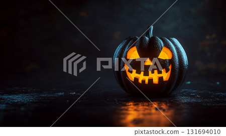 A glowing carved pumpkin with a sinister face is set against a dark, eerie background. Concept of Halloween. For seasonal or holiday-themed promotions. A glowing carved pumpkin with a sinister face is set against a dark, eerie background. Concept of Halloween. For seasonal or holiday-themed promotions. 131694010