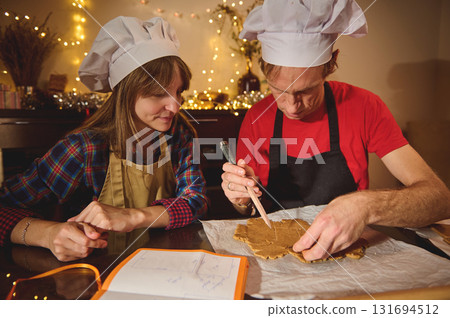 Cooking Duo: Family Friends Team Up in Festive Kitchen 131694512