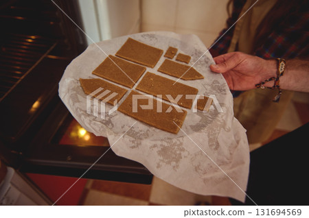 Homemade Gingerbread Pieces On Parchment: Fresh Baked Squares For Holiday Treats 131694569