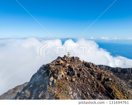 Man on Top of Mount Pico. Pico Island, Azores. Portugal. Aerial View 131694761