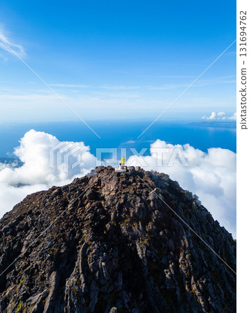 Man on Top of Mount Pico. Pico Island, Azores. Portugal. Aerial View 131694762