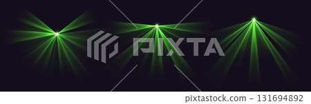 Party laser beams, green disco show spotlights, concert stage lights. Glowing show lasers. Magic rays for a dance party. 131694892