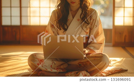 Photo of a woman working a side job in a Japanese-style room | A modern Japanese-style, relaxing work-from-home scene 131696091