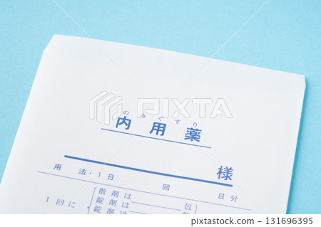Close-up of an oral medication bag on a light blue background 131696395
