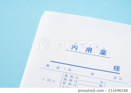 Close-up of an oral medication bag on a light blue background 131696396