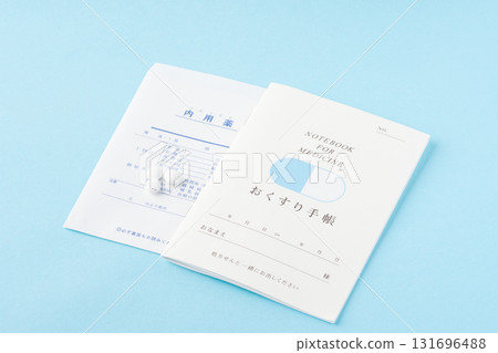 Medicine notebook and medicine on a light blue background 131696488