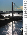 Backlit railing of Urban Gate Bridge 131696759