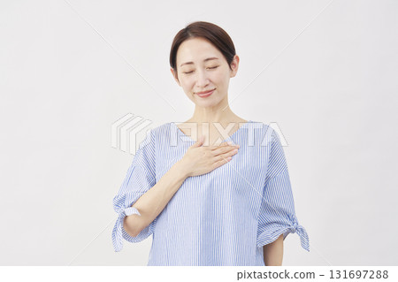 Woman, middle-aged, relieved, white background 131697288