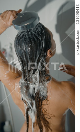 Enjoy a Refreshing Shower Experience with Flowing, Beautiful Hair and Perfect Skin 131698418