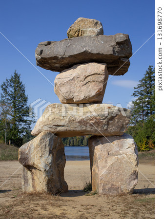 Inukshuk sculpture in Muskoka park, Canada. 131698770