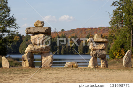 Inukshuk sculpture in Muskoka park, Canada. Inukshuk sculpture in Muskoka park, Canada. 131698771